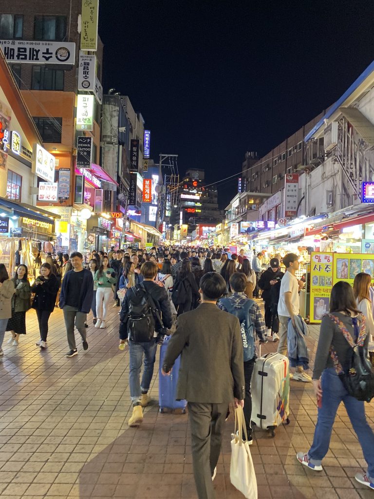 People in Seoul at night